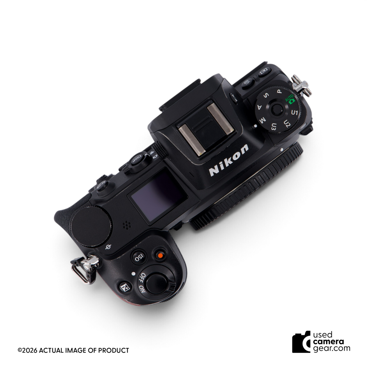 Top view of a used Nikon Z6 full-frame mirrorless camera body featuring dials and buttons on a black magnesium body.