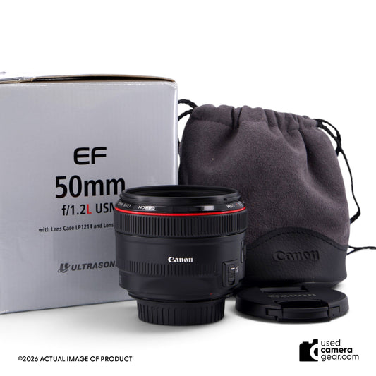 usedcameragear Canon EF 50mm f/1.2L USM lens with lens pouch, front cap, and original box on a white background
