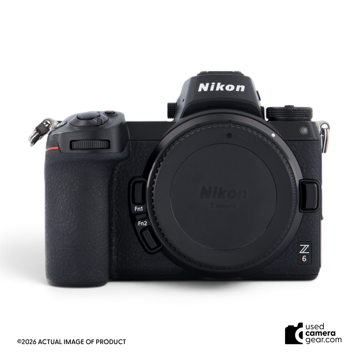 Used Nikon Z6 full-frame mirrorless camera body in black with lens mount cap, front view.