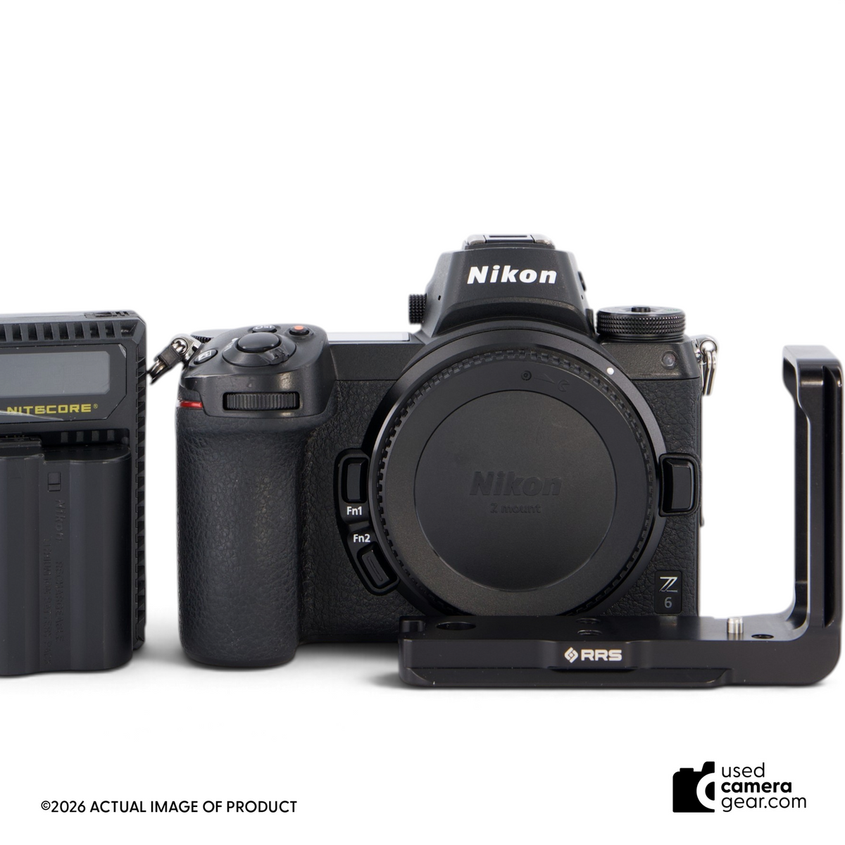 Used Nikon Z6 mirrorless camera body in black with attached RRS L-bracket, front view.