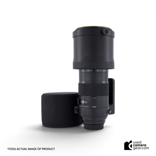 usedcameragear Sigma 150-600mm f/5-6.3 DG OS HSM Sports lens for Canon EF with lens hood on a white background
