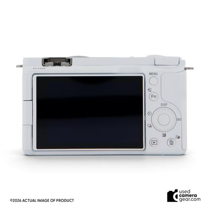 Back view of white Sony ZV-E10 II mirrorless camera showing the vari-angle LCD screen and control buttons.
