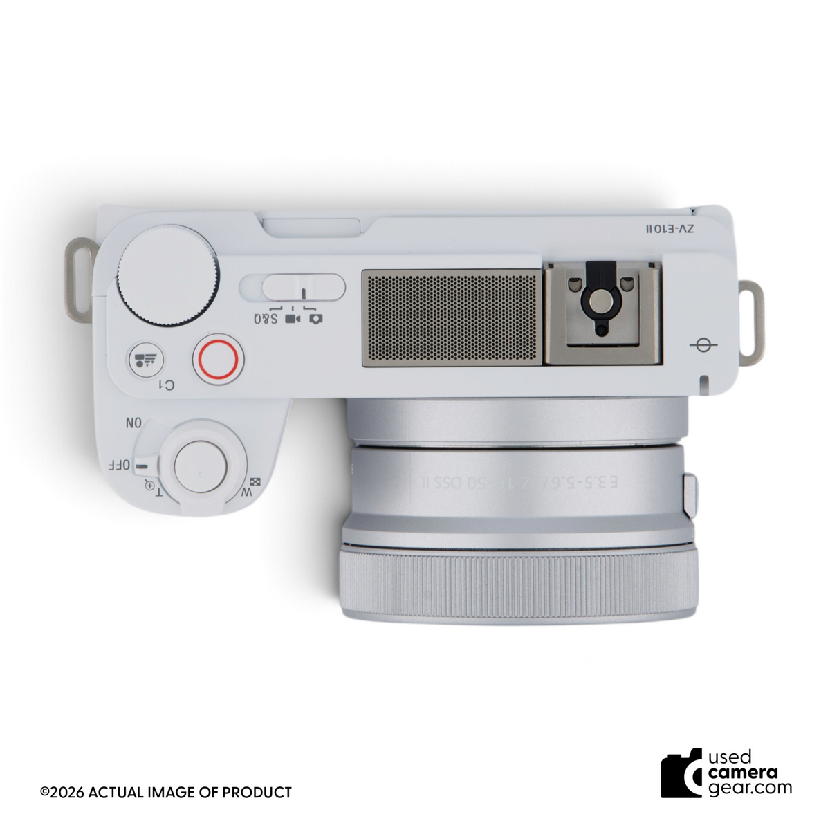 Top view of white Sony ZV-E10 II mirrorless camera with 16-50mm power zoom lens attached.