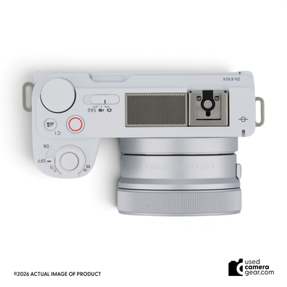 Top view of white Sony ZV-E10 II mirrorless camera with 16-50mm power zoom lens attached.